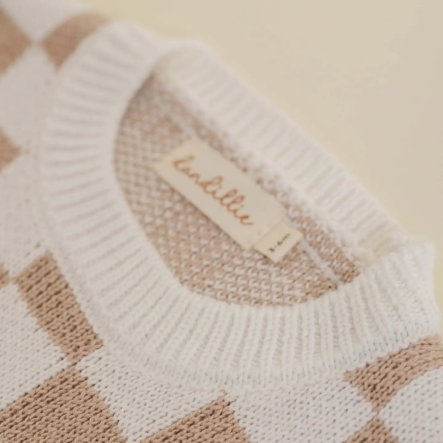 FINLEY CHECKER KNIT SWEATER