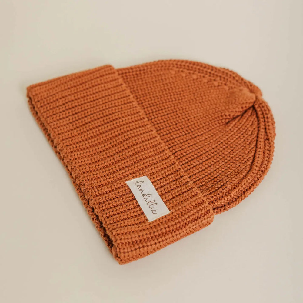 
                  
                    KNIT BEANIE
                  
                