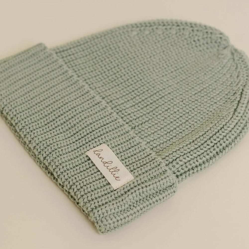 
                  
                    KNIT BEANIE
                  
                