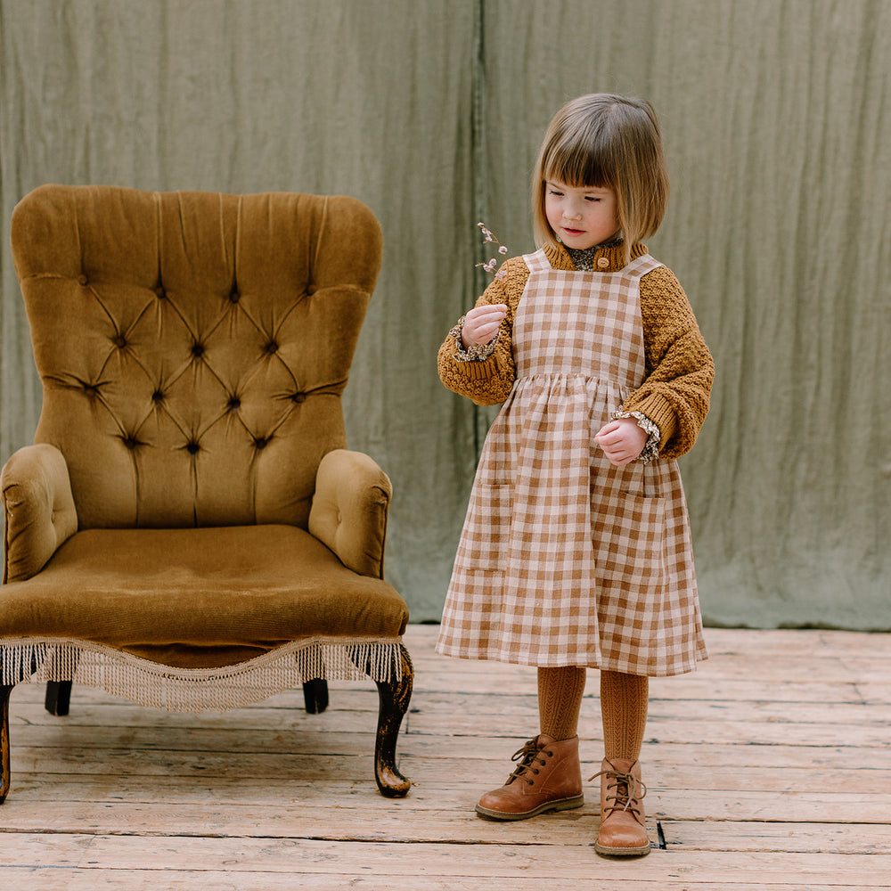 
                  
                    CONKERS PINAFORE - CARAMEL and OAT CHECK LINEN
                  
                