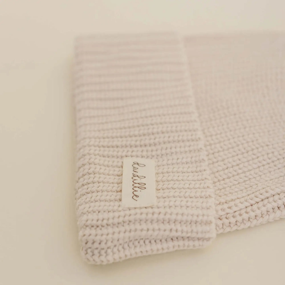 
                  
                    KNIT BEANIE
                  
                